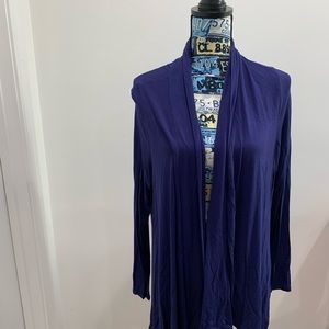 Front of closet blue cardigan